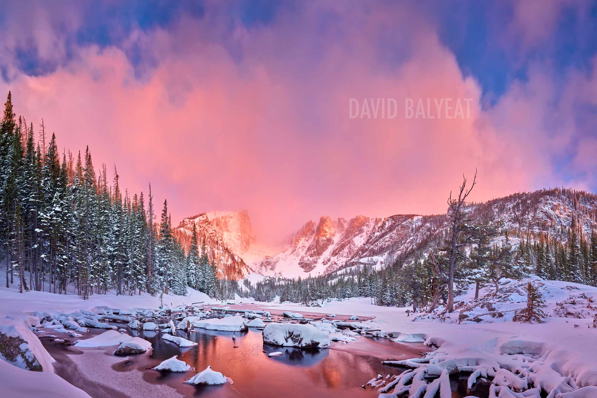 dream Lake Winter Sunrise with snow-capped peaks in Rocky Mountain National Park